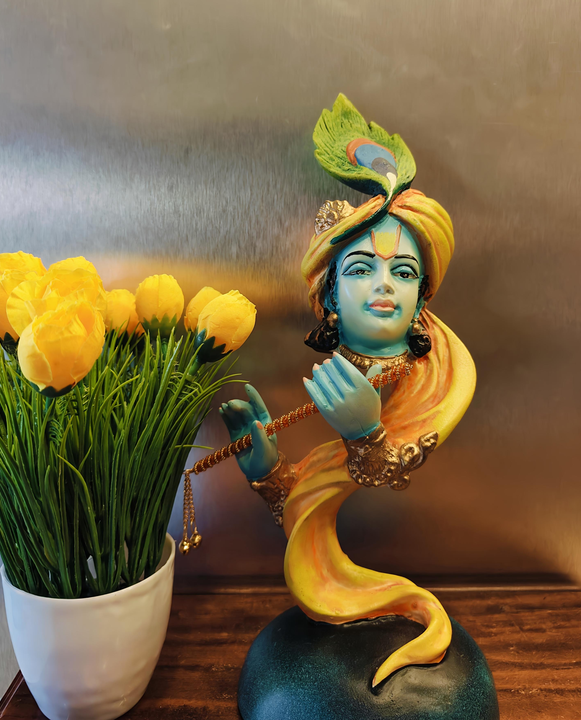 Krishna statue with flute